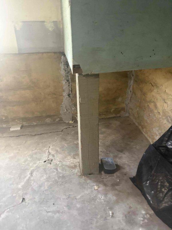 Conducted comprehensive site assessment of basement area to provide estimate for drain tile installation and additional sump pump system. Evaluated existing conditions including concrete floor deterioration, moisture indicators, and structural support elements. Documented current basement layout including storage areas and utility spaces to determine optimal routing for perimeter drain tile system and secondary sump pump placement. Assessed wall conditions, floor integrity, and drainage requirements necessary for complete waterproofing solution.