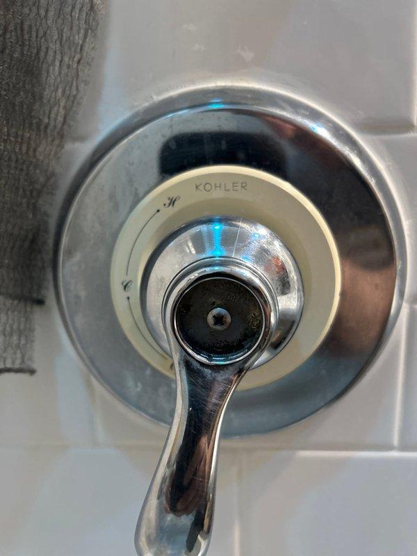 Completed installation of new toilet unit. Replaced existing fill valve assembly with new mechanism to ensure proper water flow and tank filling operation. Removed tank lid to access internal components and installed black fill valve system with adjustment features. Verified proper seating of all tank components and confirmed water level settings. Tested flush mechanism and fill cycle to ensure optimal performance and proper shutoff function.
