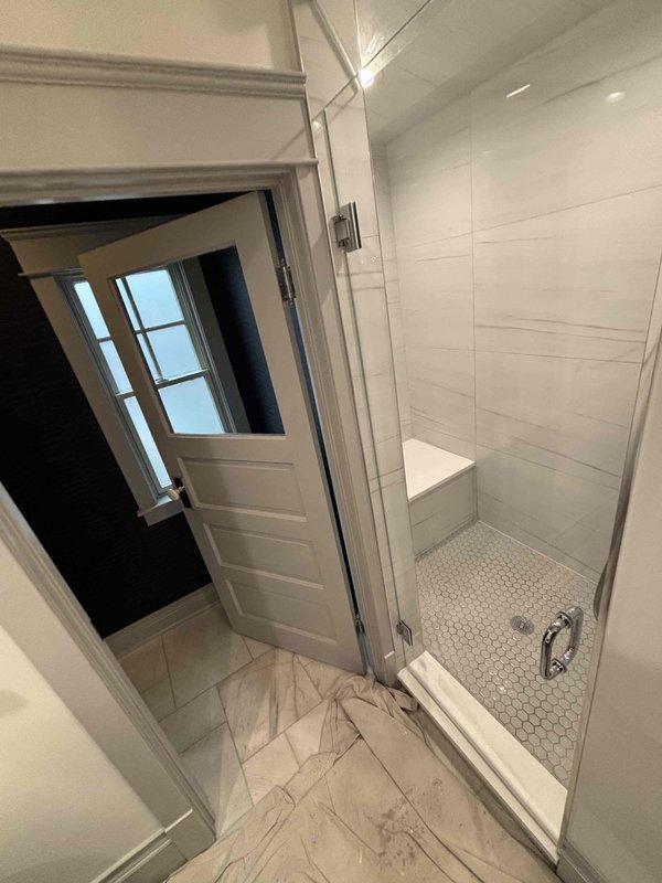Responded to call regarding leaking shower drain that began several weeks prior. Upon arrival, determined drain access was obstructed and inaccessible from above due to existing tile installation. Created access point through ceiling below shower pan to locate and address leak source. Successfully identified compromised drain assembly, performed necessary repairs to eliminate water intrusion, and restored affected areas upon completion.