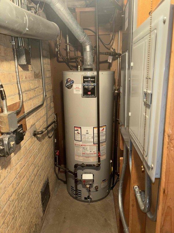 Completed comprehensive VIP plumbing maintenance inspection of residential property. Performed thorough evaluation of Bradford White water heater unit in basement mechanical room, verifying proper operation of all valves, connections, and safety mechanisms, and inspected ductwork ventilation system. Examined kitchen double-sink plumbing configuration including garbage disposal unit, drain assemblies, PVC piping connections, and electrical components to ensure all systems were functioning correctly with no leaks or operational issues detected.