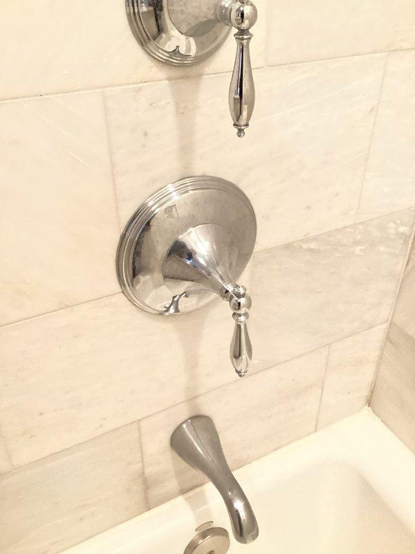 Responded to service call for toilet wax ring replacement and shower temperature adjustment in master bathroom. Successfully replaced deteriorated wax ring on corner-mounted toilet to eliminate leaking and ensure proper seal between fixture and drain flange. Adjusted shower valve temperature control to restore adequate hot water flow, which had been insufficient for approximately one week prior to service.