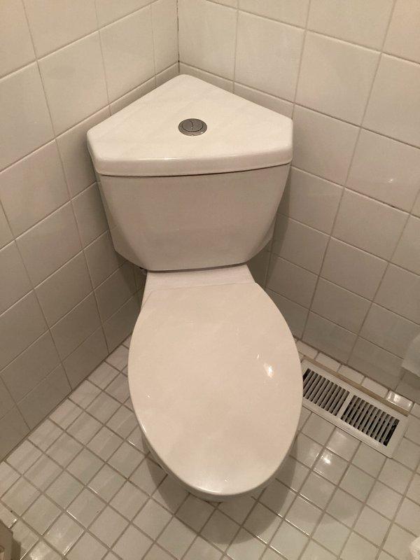 Responded to service call for toilet wax ring replacement and shower temperature adjustment in master bathroom. Successfully replaced deteriorated wax ring on corner-mounted toilet to eliminate leaking and ensure proper seal between fixture and drain flange. Adjusted shower valve temperature control to restore adequate hot water flow, which had been insufficient for approximately one week prior to service.