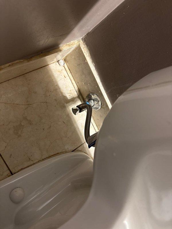 Responded to service call for leaking toilet supply valve. Upon inspection, found the existing fill valve had failed and was actively leaking, causing water damage and unsanitary conditions around the base of the fixture. Shut off water supply to the toilet, removed the deteriorated valve assembly, and installed a new replacement fill valve with updated supply line connection. Tested system for proper operation and verified no additional leaks were present. Restored water supply and confirmed toilet functionality before completing the service.