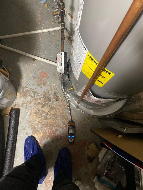 Responded to service call for reported gas leak on water heater and performed VIP maintenance on secondary unit. Upon arrival, conducted thorough inspection of both Bradford White water heaters in basement utility area. Utilized gas detection equipment to locate and assess reported leak on first unit, checking all gas line connections, control valve, and burner assembly connections. Performed complete VIP maintenance protocol on second water heater, including inspection of temperature and pressure relief valve, anode rod assessment, burner combustion analysis, gas line connections verification, and testing of all safety controls. Examined copper supply piping, brass shut-off valves, and compression fittings on both units for proper operation and signs of corrosion or wear. Verified proper venting and clearances around both water heaters in accordance with manufacturer specifications and local code requirements. Documented equipment conditions with photographic evidence showing installa