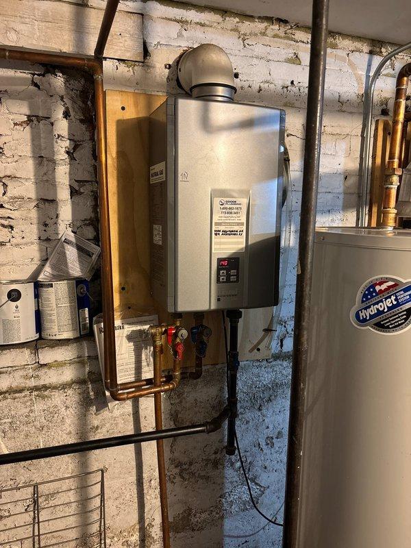 Performed routine maintenance flush on tankless water heater system. Completed descaling procedure to remove mineral buildup and ensure optimal heat exchanger performance. System inspected copper supply and discharge lines, pressure relief valve, and venting connections. No operational issues identified, unit operating within normal parameters upon completion.