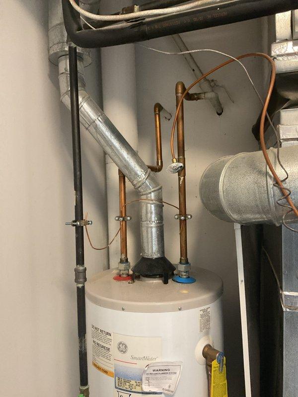 Responded to no hot water complaint affecting shower and jacuzzi fixtures. Upon inspection, diagnosed issue with GE SmartWater residential water heater system. Verified proper copper supply line connections, inspected hot water distribution piping, and tested water heater operation including thermostat settings and heating element functionality. Restored hot water service to all affected fixtures throughout the residence.