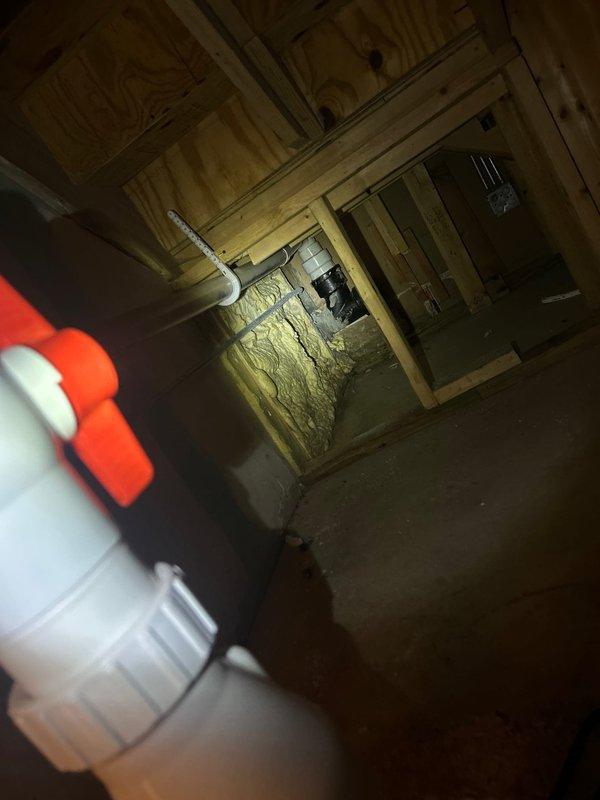 Completed follow-up service call to install complimentary float switch for ion system in basement utility area. Installed float switch assembly on existing white PVC drainage piping system in crawlspace, ensuring proper placement and secure mounting for reliable water level detection and system protection.