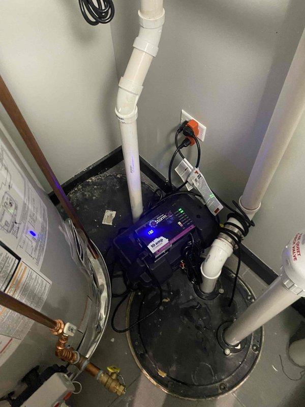 Responded to a clogged sump pump in the basement of a 10-year-old home. Upon inspection, found the existing pump had failed due to debris accumulation and motor malfunction. Removed and disposed of the old sump pump unit, including disconnecting electrical connections and plumbing lines. Installed a new sump pump system with proper discharge piping, tested operation to ensure proper float switch activation and water evacuation, and verified all electrical connections were secure and functioning correctly.
