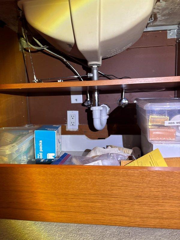 Replaced defective mixing valve in shower faucet with customer-supplied unit, restoring proper temperature control and water flow. Repaired leaking sink faucet by inspecting under-cabinet plumbing connections and addressing the source of the leak. Both fixtures tested and verified operational upon completion.