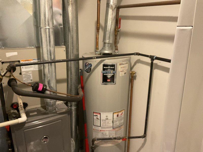 Responded to emergency gas leak affecting three residential units with gas service currently shut off by utility company. Performed comprehensive pressure testing on gas distribution system to identify leak source. Inspected all gas piping, connections, and appliances including furnace and water heater in mechanical room. Located compromised gas line connections with brass fittings and black iron piping. Tested all joints and valves using approved leak detection methods. Documented equipment conditions and piping configurations throughout affected areas. System requires repairs to gas piping connections before utility company can restore service and units can be safely reactivated.