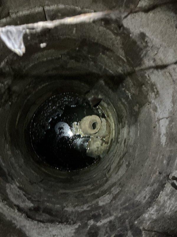 Responded to priority service call for kitchen sink draining very slowly. Upon inspection, accessed drain system and documented heavy sediment buildup and grime accumulation within the drain pit and connecting lines. Cleared obstruction and restored proper drainage flow to kitchen sink. Provided information regarding preventative maintenance membership options as requested.