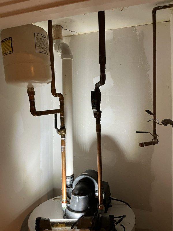 Completed VIP maintenance inspection on residential water heater system including tank and expansion tank assessment. Inspected all plumbing connections, copper piping, pressure relief valve, and expansion tank mounting. Verified proper operation of heating elements, thermostat settings, and electrical connections. All components found to be functioning within normal parameters with no leaks or safety concerns identified.