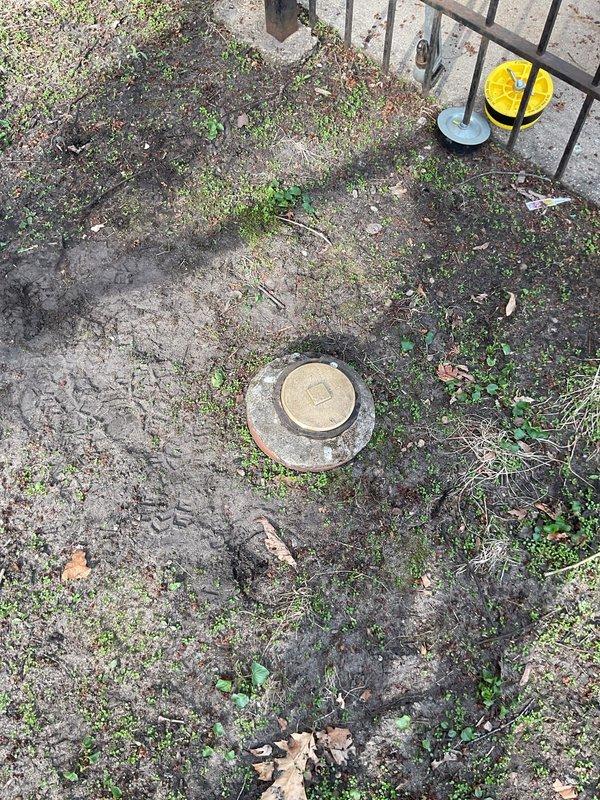 Completed comprehensive plumbing repair proposal with deferred payment structure tied to scheduled maintenance visits. Documented existing utility infrastructure including outdoor utility access point with concrete pad and service cover, along with interior basement plumbing system featuring vertical PVC drainage piping, electrical conduit routing, and junction boxes mounted to exposed brick wall. Down payment collected at time of sale, with remaining balance to be split across two future scheduled maintenance appointments in subsequent years.