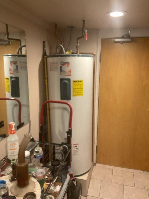 Completed estimate for heat pump water heater replacement to upgrade existing 80-gallon electric water heater system. Assessed current dual water heater installation in utility room, documented existing Richmond brand electric units with 6-year limited warranty, and evaluated plumbing connections including copper and flexible supply lines. Provided recommendations for transitioning to energy-efficient heat pump water heater technology to reduce operational costs and improve system performance.
