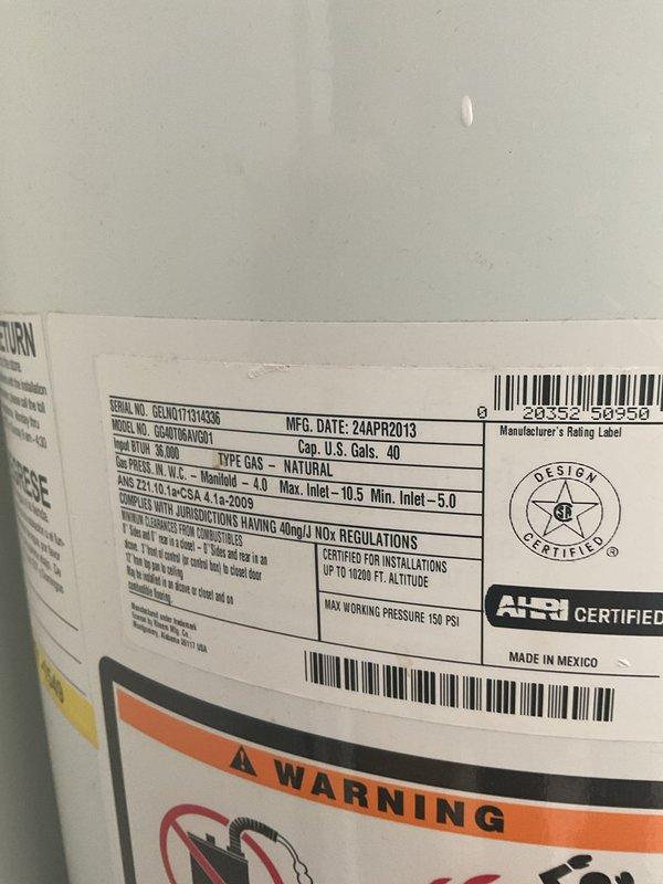 Responded to service call for leaking valve on 40-gallon natural gas water heater manufactured in April 2013. Upon inspection, identified leaking temperature and pressure relief valve with visible moisture accumulation. Replaced defective T&P relief valve with new code-compliant unit, tested for proper operation and verified no additional leaks present. Inspected remaining plumbing connections and tank condition, confirming system restored to normal operating parameters.