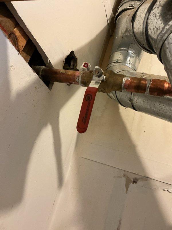 Completed removal of existing tanked water heater per customer request. Disconnected water supply lines and capped copper piping connections with shut-off valves to secure the system. Customer will schedule separate appointment for new water heater installation at a later date.
