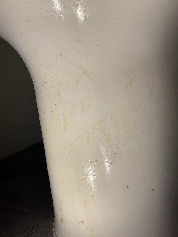 Responded to warranty callback for leaking toilet wax ring. Upon arrival, inspected toilet base and confirmed active leak at floor connection. Removed and replaced defective wax ring with new premium seal. Reinstalled toilet, ensuring proper alignment and secure mounting. Tested flush operation and verified complete seal with no water seepage at base connection.