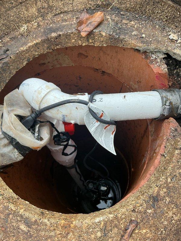 Responded to a basement backup issue caused by heavy rainfall. Upon inspection, accessed the main sewer line through an underground cleanout chamber, which exhibited significant corrosion and aging. Performed thorough camera inspection and clearing of the line to restore proper drainage. Additionally, inspected and addressed a secondary drainage point at a floor drain location showing extensive water damage, mineral deposits, and deterioration around the fixture. Cleared blockages, verified proper flow through both access points, and confirmed the drainage system was functioning correctly to prevent future backup incidents during rain events.