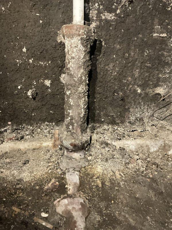 Responded to water intrusion issue in crawl space. Performed sewer line camera inspection to assess mainline condition and identify potential blockages or damage. Documentation revealed heavily corroded copper piping with extensive mineral deposits and deterioration, along with standing water present in crawl space area requiring further evaluation for possible mainline rodding service.