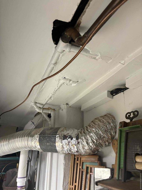 Responded to low water pressure complaint isolated to shower/tub area while rest of house maintained normal pressure. Investigated bathroom-specific plumbing infrastructure and accessed ceiling cavity to inspect supply lines serving the affected fixtures. Identified deteriorated piping and restricted flow conditions in the dedicated bathroom supply lines. Replaced compromised piping sections with new copper and PVC materials, ensuring proper sizing and secure mounting with appropriate hangers and straps. Restored full water pressure to shower/tub fixtures and verified system integrity throughout the bathroom plumbing network.