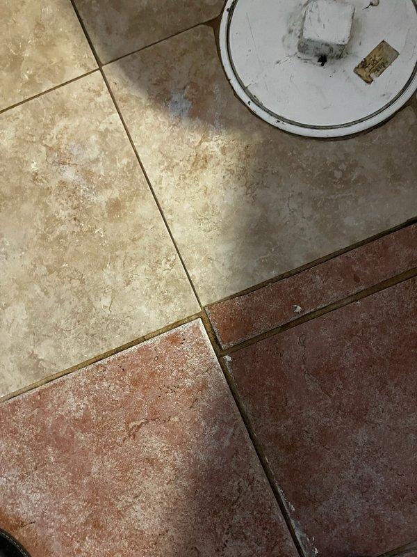 Responded to clogged drain service call and accessed main sewer line through floor cleanout. Deployed professional drain cleaning machine with cable to clear obstruction in main line. Successfully restored proper drainage and flow to affected fixtures, verified system operation, and left premises clean with all equipment properly stowed.
