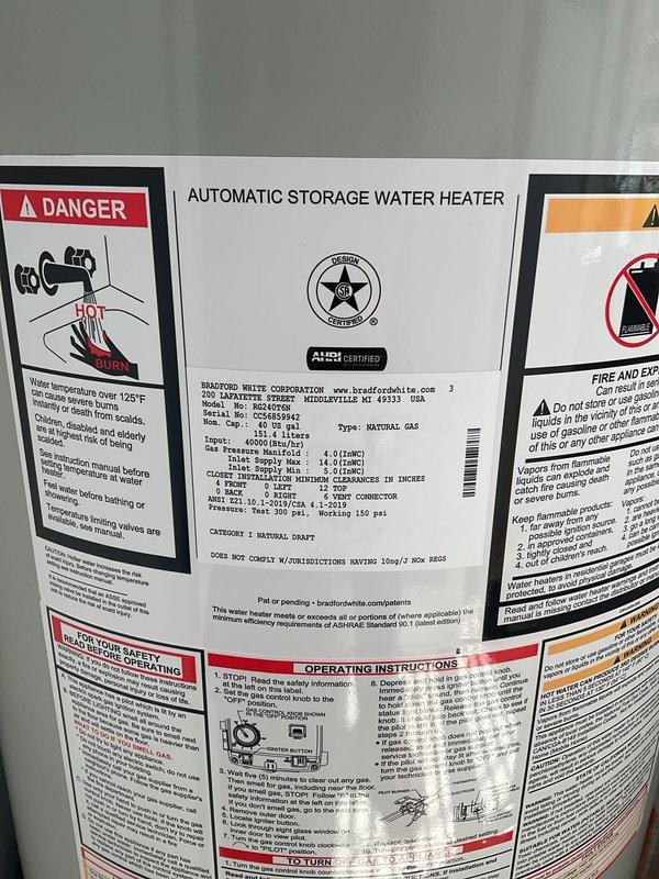 Completed morning appointment for water heater inspection and repair sale. Evaluated Bradford White automatic storage water heater model W22470T6 installed in closet space with standard copper supply line connections and PVC venting. Documented unit condition with all manufacturer labels, safety warnings, and specification plates intact and legible. All plumbing connections, drain pan, and venting configuration photographed and confirmed to be in proper working order for customer records and future service reference.