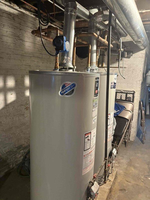 Responded to commercial building experiencing hot water issues with recently installed tank water heater system. Performed comprehensive inspection of stainless steel commercial water heater unit, all associated plumbing connections, circulation pump, and venting components to provide second opinion on previously recommended cartridge replacements. Evaluated system performance, examined copper piping, circulator pump operation, T-fitting check valves, and all mechanical connections to identify root cause of inadequate hot water supply throughout the building.