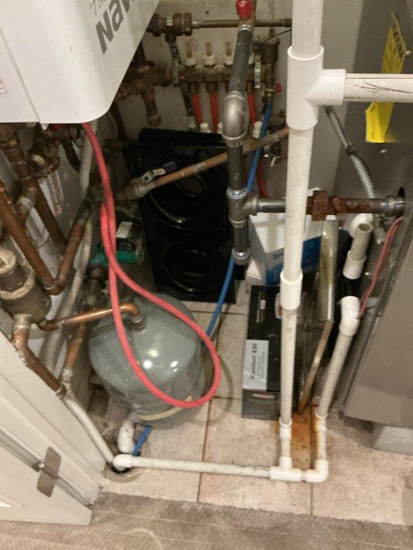Completed VIP plumbing maintenance inspection of residential mechanical system. Performed testing and evaluation of HVAC condensate pump assembly by submerging unit in water bucket to verify proper operation and sensor functionality. Inspected hydronic heating system components including expansion tank, manifold distribution system, copper supply lines, PVC drainage piping, and associated shut-off valves for leaks, corrosion, or operational concerns. All equipment found operating within normal parameters with no immediate repairs required.