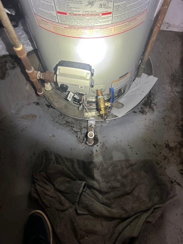 Successfully replaced a 50-gallon slim-profile residential gas water heater under manufacturer warranty. Retrieved the replacement unit from Ferguson supply house on Western Avenue per warranty requirements and completed full installation in basement utility area. Removed failed unit, installed new water heater with proper gas valve connections, copper supply line hookups, and PVC drainage configuration. Verified all plumbing connections for leaks, tested gas valve operation, and confirmed proper venting. Unit is fully operational with temperature controls set and all safety features functioning correctly.