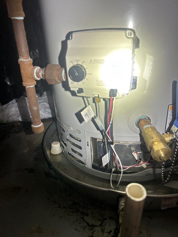 Successfully replaced a 50-gallon slim-profile residential gas water heater under manufacturer warranty. Retrieved the replacement unit from Ferguson supply house on Western Avenue per warranty requirements and completed full installation in basement utility area. Removed failed unit, installed new water heater with proper gas valve connections, copper supply line hookups, and PVC drainage configuration. Verified all plumbing connections for leaks, tested gas valve operation, and confirmed proper venting. Unit is fully operational with temperature controls set and all safety features functioning correctly.