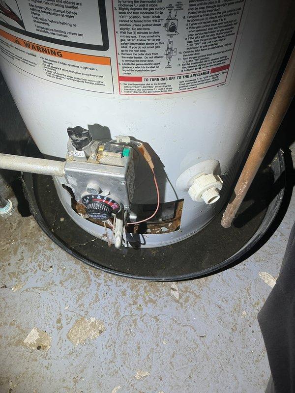 Responded to priority commercial drain and sewer estimate request. Upon arrival, conducted thorough inspection of the facility's plumbing infrastructure, including water heater installation and underground drainage system. Documented existing conditions with detailed photography of gas-fired water heater assembly, including control valve mechanisms, copper and PVC piping connections, and base installation on concrete slab. Performed visual assessment of circular concrete drainage structure, identifying accumulated sediment, debris, and mineral deposits at base level with evidence of moisture infiltration and surface deterioration along interior walls. Provided comprehensive estimate for required drain and sewer work based on observed conditions and system evaluation.