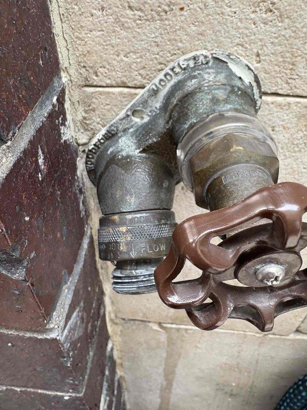 Responded to service call for outdoor spigot with no water flow despite being in open position. Upon inspection, identified failed vacuum breaker (backflow preventer) assembly on exterior hose bib. The ASSE-rated vacuum breaker showed signs of age, weathering, and internal component failure preventing water passage through the fixture. Replaced defective vacuum breaker unit, restored full water flow to outdoor spigot, and verified proper operation of shutoff valve and threading connections.