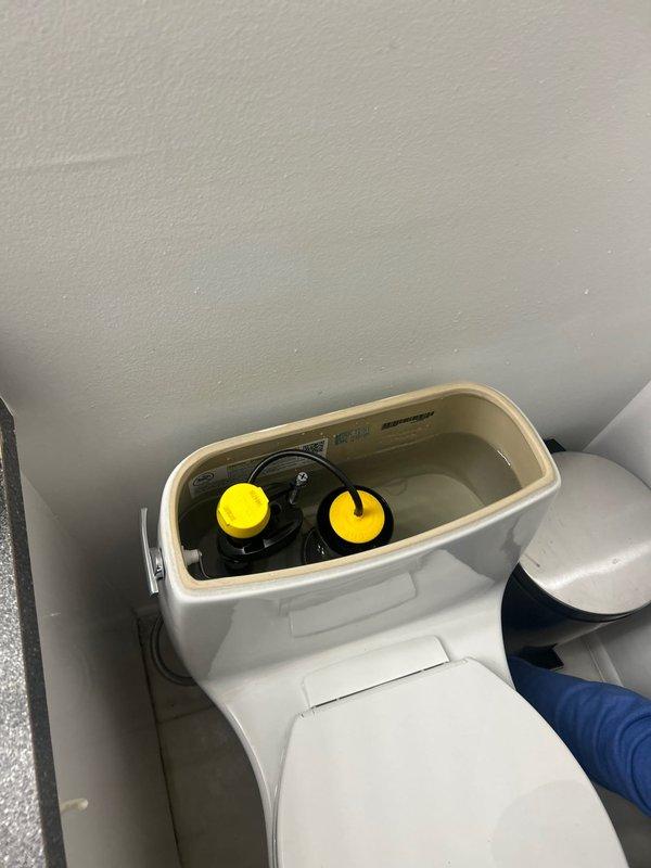 Responded to main drain cleanout service call and successfully cleared blockage caused by deteriorated debris material lodged in the line. Removed frayed synthetic fiber obstruction and damaged conduit material that had accumulated in the drainage system. Verified proper flow restoration through the main line and confirmed all fixtures, including toilet, were draining properly upon completion.