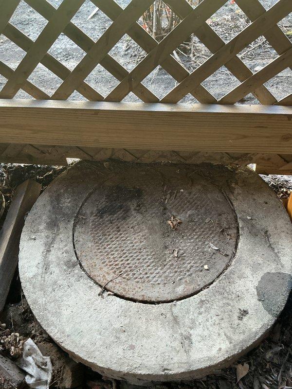 Responded to a priority call for water backing up through a drain at a property where previous major work was completed. Upon inspection, accessed the main sewer line through an exterior cleanout located beneath deck lattice skirting. Deployed inspection camera equipment to locate the obstruction, identifying significant debris accumulation within the line at approximately 12 feet 5 inches from the access point. Successfully cleared the blockage and restored proper drainage flow. Documented findings with photographic evidence of the obstruction and access point for service records.