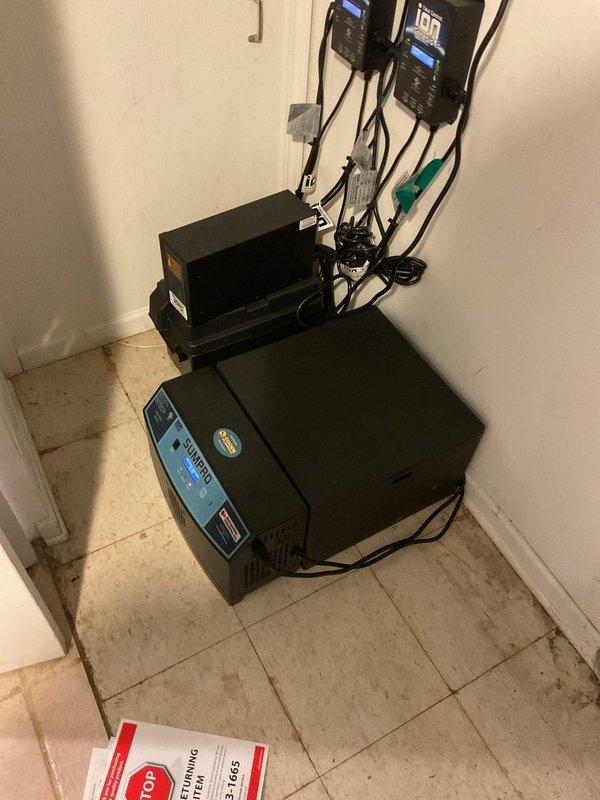 Performed comprehensive inspection of sump pump and ejector pump systems in basement of 26-year-old residence. Both pumps were found operating properly with no mechanical issues, leaks, or performance concerns noted at time of service. Documented equipment condition with photos for maintenance records.
