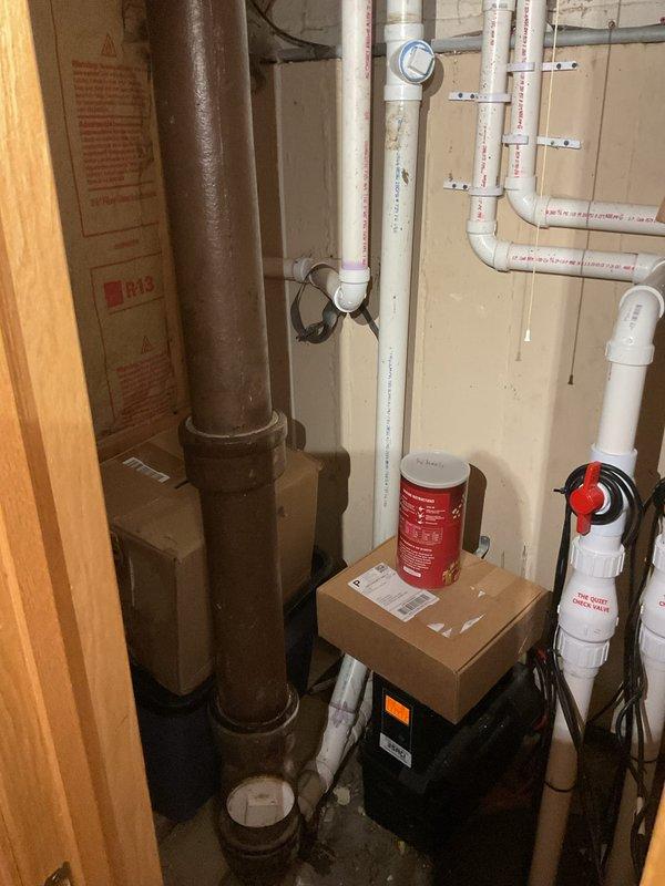 Responded to basement drainage backup occurring after heavy rainfall. Upon inspection, identified sewage backing up into basement shower due to main drain line obstruction. Accessed drainage system through basement utility area near laundry room and mechanical equipment. Performed diagnostic assessment of plumbing infrastructure, including inspection of main drain lines and sewer ejector pump system. Cleared blockage from main drain line, restoring proper flow and eliminating backup condition. Verified all fixtures draining properly and confirmed sewer pump operational status before completing service.