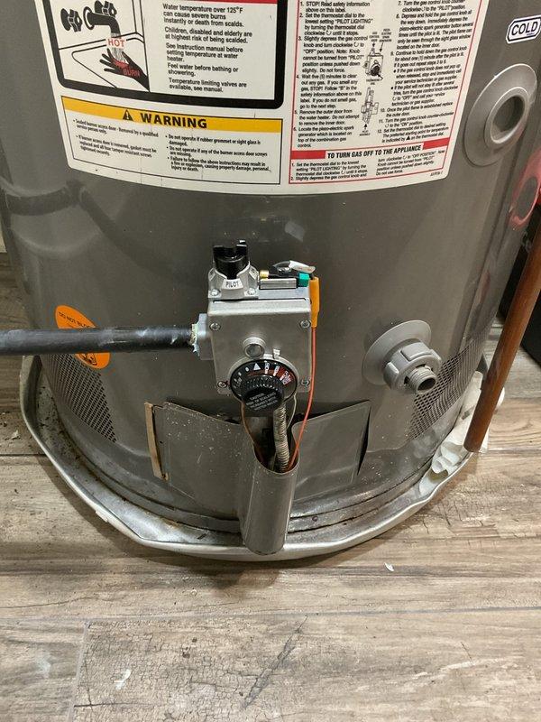 Responded to water heater repair service call and performed diagnostic inspection on 75-gallon natural gas water heater (Model XG75T06ST76U0, manufactured August 2018). Identified faulty gas control valve assembly requiring replacement. Ordered replacement part through Ferguson HVAC for pickup on will call. Documented equipment condition and gas control valve configuration with photos. Scheduled return visit to complete installation of new gas control valve and restore unit to proper operation.