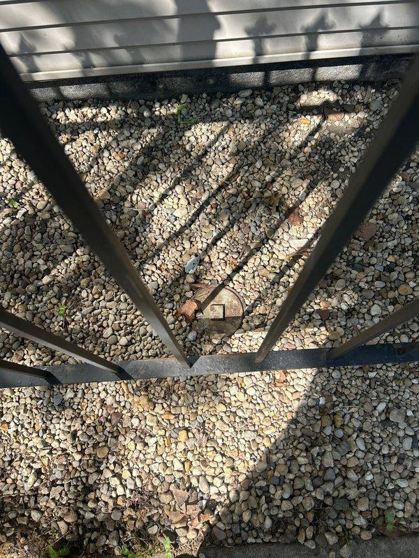 Responded to service call for gas line repair and pressure testing at residential property. Upon arrival, inspected exterior gas meter assembly and discovered corroded piping and deteriorated connections showing significant rust damage on multiple components. Performed gas line repair by replacing compromised sections of pipe and corroded fittings to restore system integrity. Conducted pressure test on repaired gas line to verify no leaks were present and system met safety standards. All connections tested and confirmed secure with proper gas flow restored to the residence.