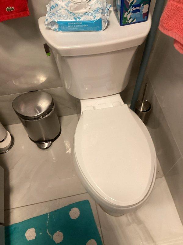 Responded to customer complaint of sewer smell in bathroom and bedroom caused by faulty toilet seal. Upon inspection, identified compromised wax ring seal at toilet base allowing sewer gases to escape into living areas. Removed and replaced defective wax ring with new seal, ensuring proper compression and gas-tight connection between toilet flange and fixture. Verified secure mounting, tested flush operation, and confirmed elimination of odor issue upon completion.
