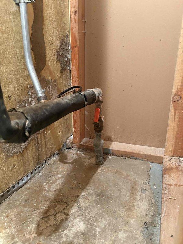 Completed plumbing estimate for whole home water filtration system installation in residential property. Assessed existing plumbing infrastructure in unfinished basement area, including exposed piping, shut-off valves, and electrical conduit routing. Documented current conditions of water supply lines, drainage systems, and available mounting locations on painted masonry walls near existing mechanical systems to determine optimal placement and connection points for life source filtration unit.