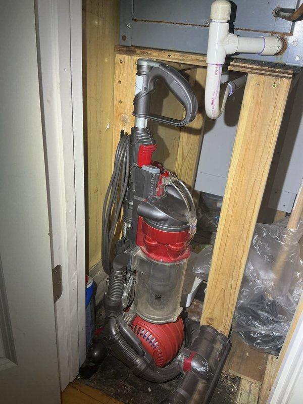 Responded to callback request regarding second floor sink installation options. Assessed existing plumbing infrastructure in utility area, including exposed PVC drain lines and supply connections. Documented current conditions showing accessible framing and routing paths for potential fixture addition. Reviewed mechanical space configuration with water heater expansion tank and existing supply lines to determine feasibility of extending plumbing to accommodate new sink location. Provided customer with available options for completing the second floor sink installation based on existing infrastructure and space constraints.