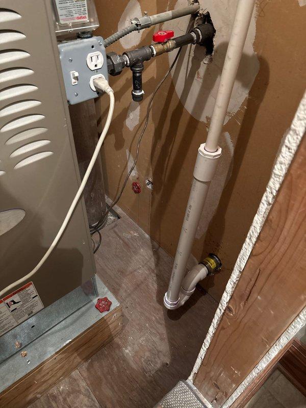Responded to service call for leaking pressure reducing valve in utility area. Customer had attempted to replace the valve but installation was not completed properly, resulting in active water drip. Performed on-site assessment of plumbing configuration, which included PVC piping, brass shut-off valves, and pressure regulation components mounted to utility room wall. Evaluated valve installation, identified improper seating and connection issues causing the leak. Provided detailed estimate for proper pressure reducing valve replacement, including removal of existing valve, installation of new pressure reducing valve with appropriate fittings, pressure testing, and system verification to ensure proper operation and eliminate water leakage.