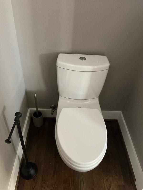 Responded to a recurring drainage issue affecting the basement toilet with slow draining conditions caused by a blockage in the sump pump discharge line. Upon inspection, identified obstruction in the drain line between the toilet fixture and sump pump system. Performed mechanical augering to clear the blockage and restore proper drainage flow. Tested toilet flush operation multiple times to verify complete clearance and confirm water is draining at normal rate without backup. System is now functioning properly with no signs of standing water or slow drainage.