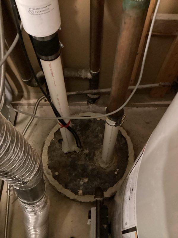 Completed comprehensive plumbing maintenance inspection on 40-year-old residential property. Performed thorough evaluation of all accessible plumbing systems including fixtures, drains, supply lines, and sump pit assembly in basement utility area. Inspected American Standard drain fixtures, PVC drainage piping, copper supply lines, and associated mechanical components. All systems found to be functioning properly with no areas of concern identified or repairs required at this time.