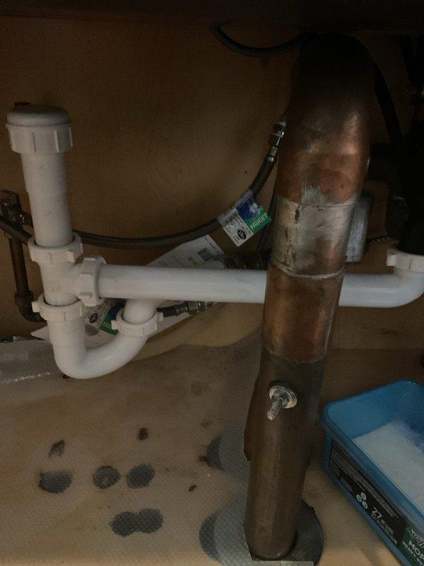 Responded to kitchen sink backup issue. Upon arrival, inspected the drainage system and identified blockage in the main drain line. Utilized drain snake equipment to clear the obstruction from the kitchen sink drain assembly. Verified proper water flow through the PVC trap assembly and drainage system. Tested sink operation to confirm complete restoration of drainage function with no further backup issues present.