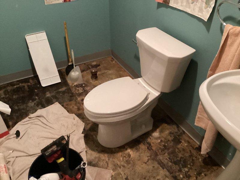 Responded to priority call for toilet leaking at base during flushing. Upon arrival, found significant water damage to bathroom subflooring requiring removal of existing flooring material to assess extent of deterioration. Diagnosed failed wax ring seal at toilet base allowing water to escape during flush cycles. Removed toilet, replaced wax ring seal, and reinstalled toilet with proper flange connection. Performed annual plumbing maintenance inspection including testing all fixtures, checking supply lines, and verifying proper drainage throughout the system.