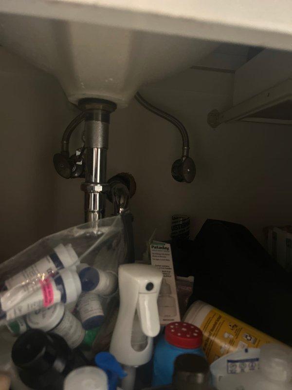 Conducted on-site assessment to provide estimate for washer hookup installation in designated laundry area. Evaluated existing plumbing infrastructure beneath adjacent sink, including P-trap assembly, supply line connections, and available shut-off valves. Determined requirements for hot and cold water supply lines, drain connection specifications, and necessary materials to complete washer installation in acoustically-treated closet space.