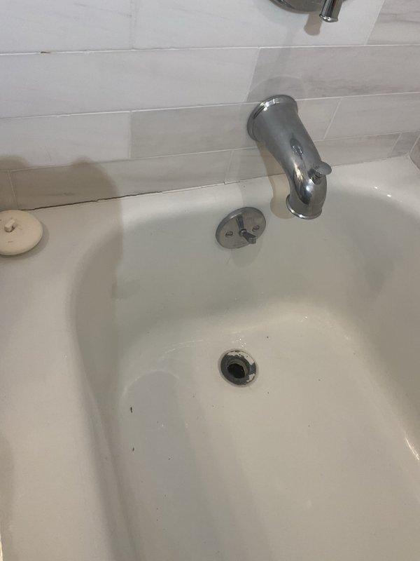 Responded to service call for slow-draining bathtub. Upon inspection, confirmed drainage issue and successfully cleared the bathtub drain line using mechanical rodding equipment to restore proper water flow and eliminate the blockage.