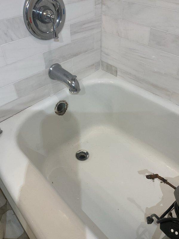 Responded to service call for slow-draining bathtub. Upon inspection, confirmed drainage issue and successfully cleared the bathtub drain line using mechanical rodding equipment to restore proper water flow and eliminate the blockage.