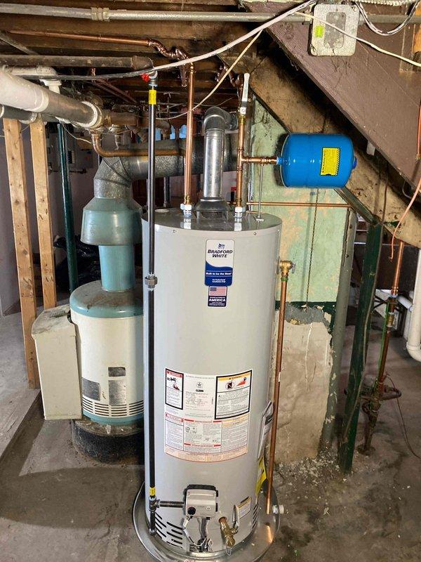 Completed comprehensive plumbing system inspection and assessment in crawl space and basement mechanical room. Evaluated copper supply lines, water heater installation, pressure tank, and water treatment equipment. All systems photographed and documented for repair proposal, with findings presented to customer for approval of recommended work.